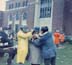 OAS_men help man put on mask_0115